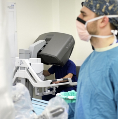 Surgeon operating a surgical robot