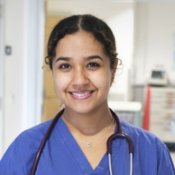 Doctor in scrubs with stethoscope